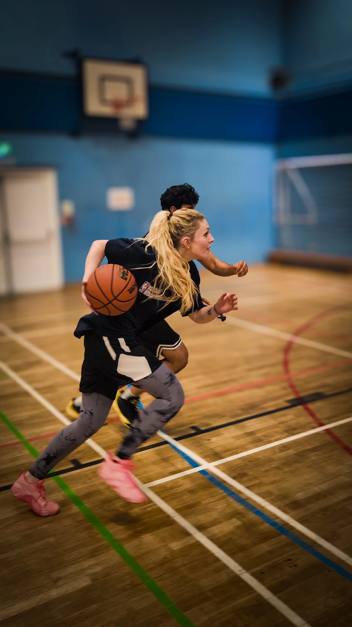 Athlete driving past a defender at game speed